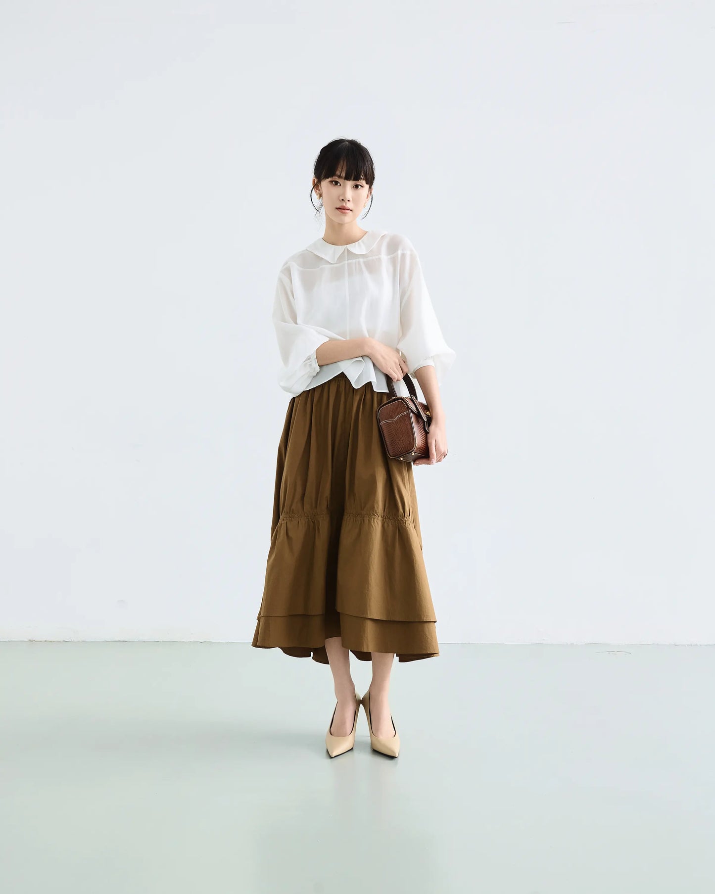 Chân váy midi xếp nhún màu xanh rêu đậm - SK9920