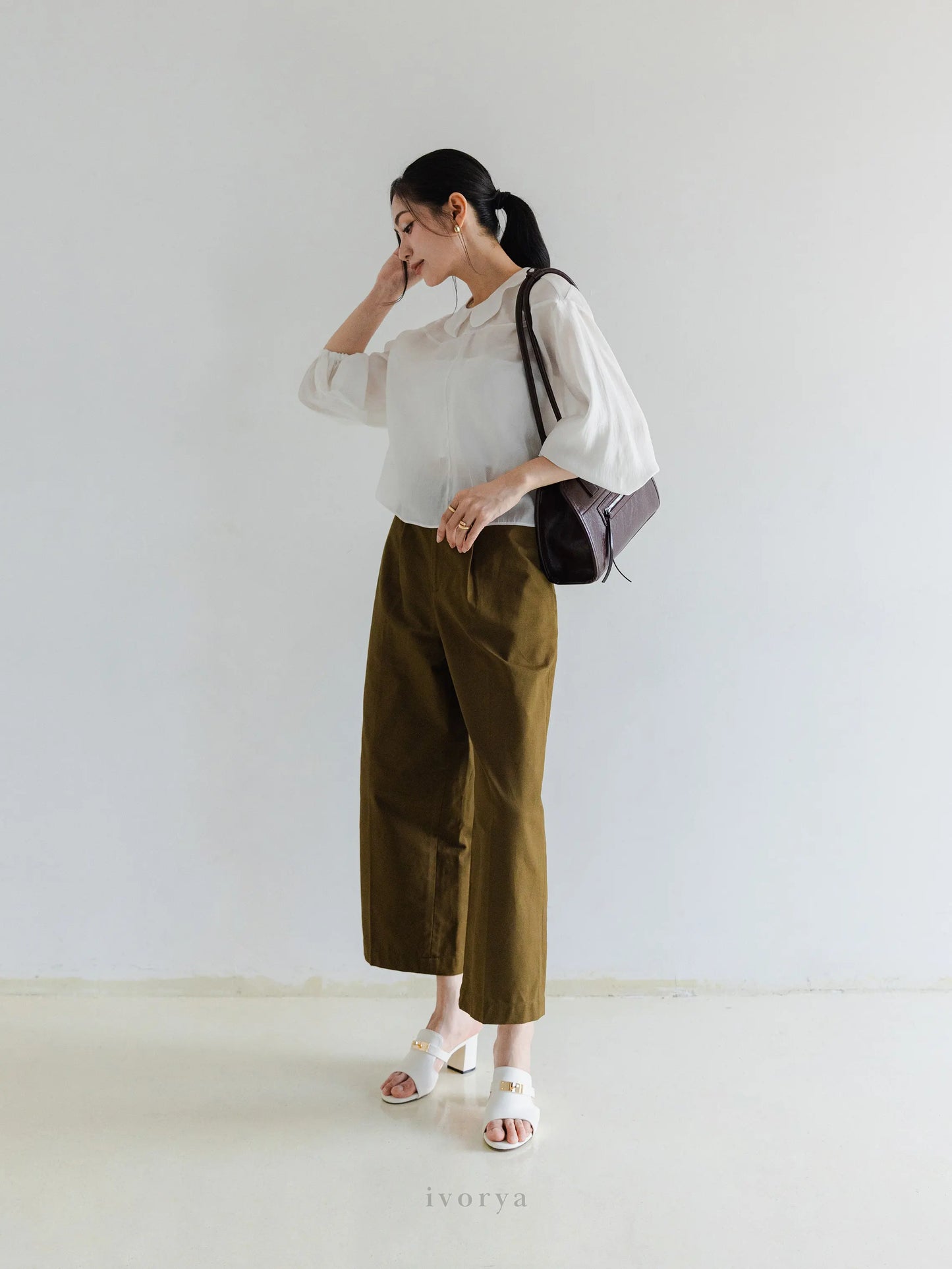 Quần tây nữ ống rộng màu xanh rêu đậm xếp ly trước - YT9925