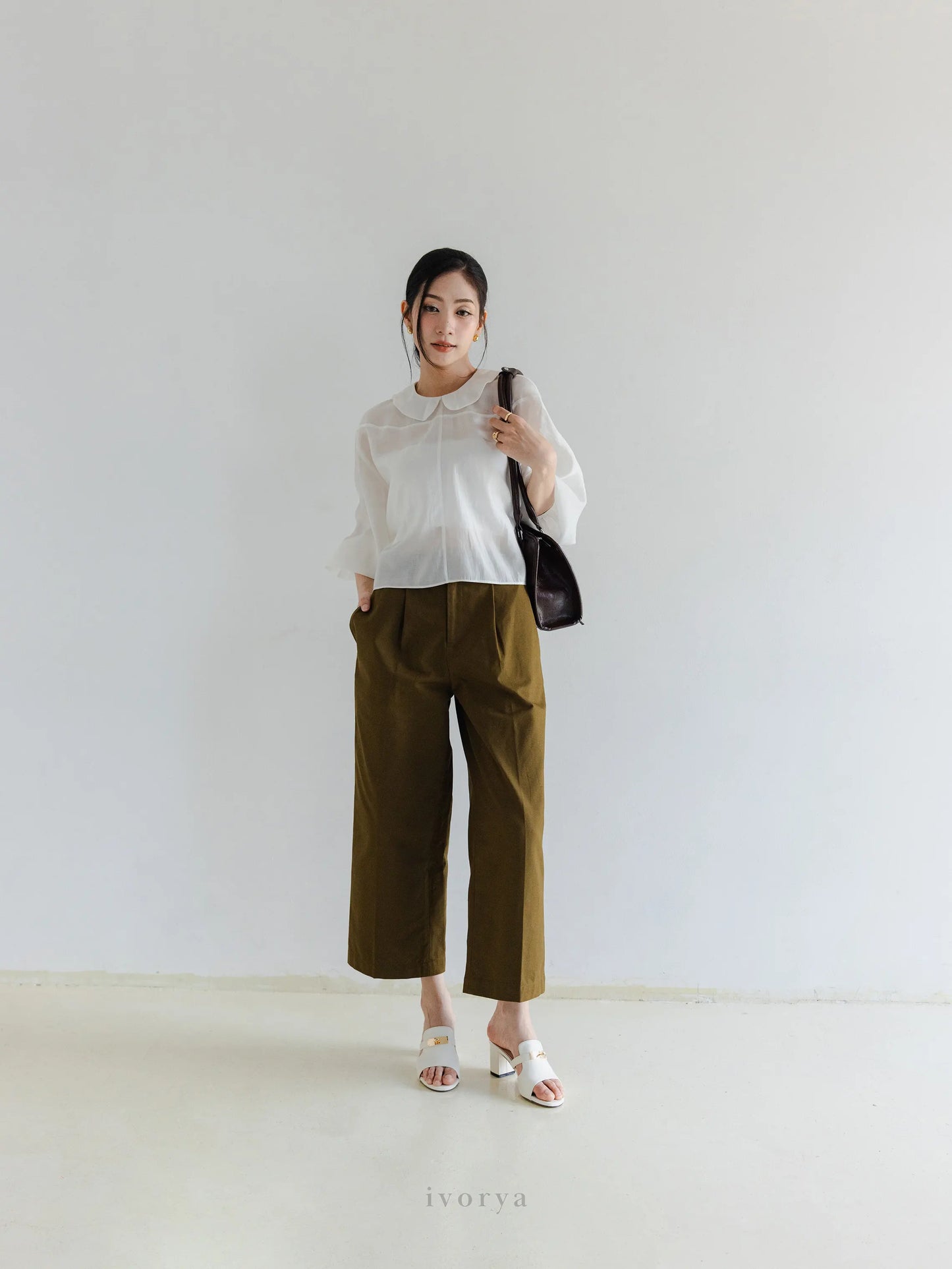 Quần tây nữ ống rộng màu xanh rêu đậm xếp ly trước - YT9925