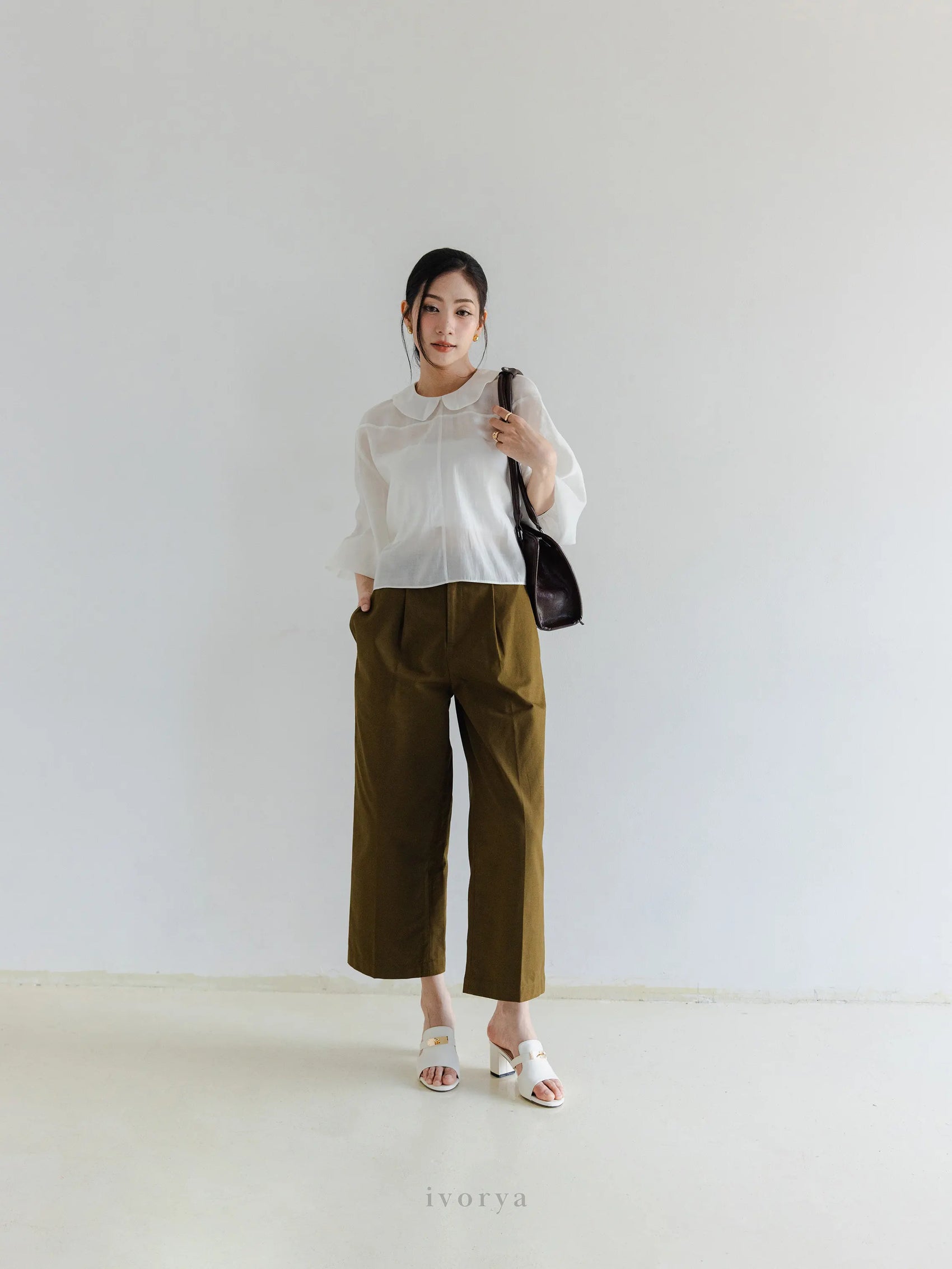 Quần tây nữ ống rộng màu xanh rêu đậm xếp ly trước - YT9925