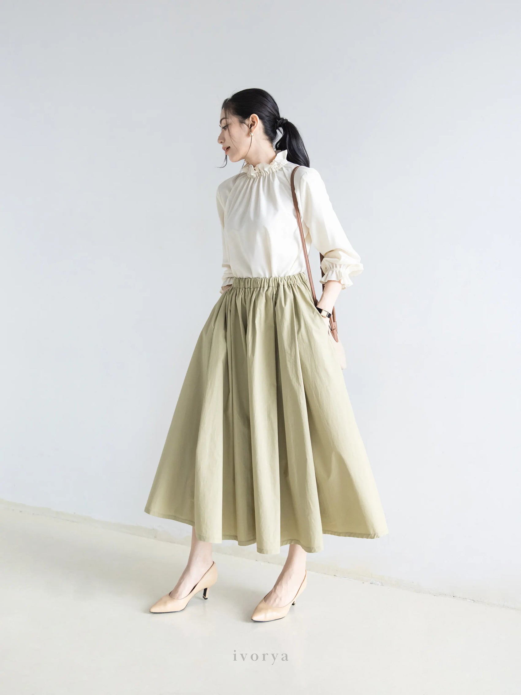 Áo kiểu nữ nhún cổ và tay màu kem tay dài - SH9945