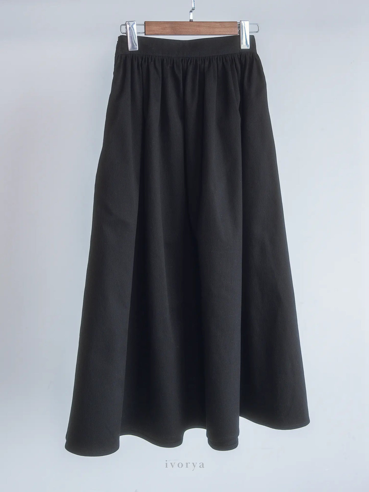 Chân váy midi màu đen cơ bản - SK9944
