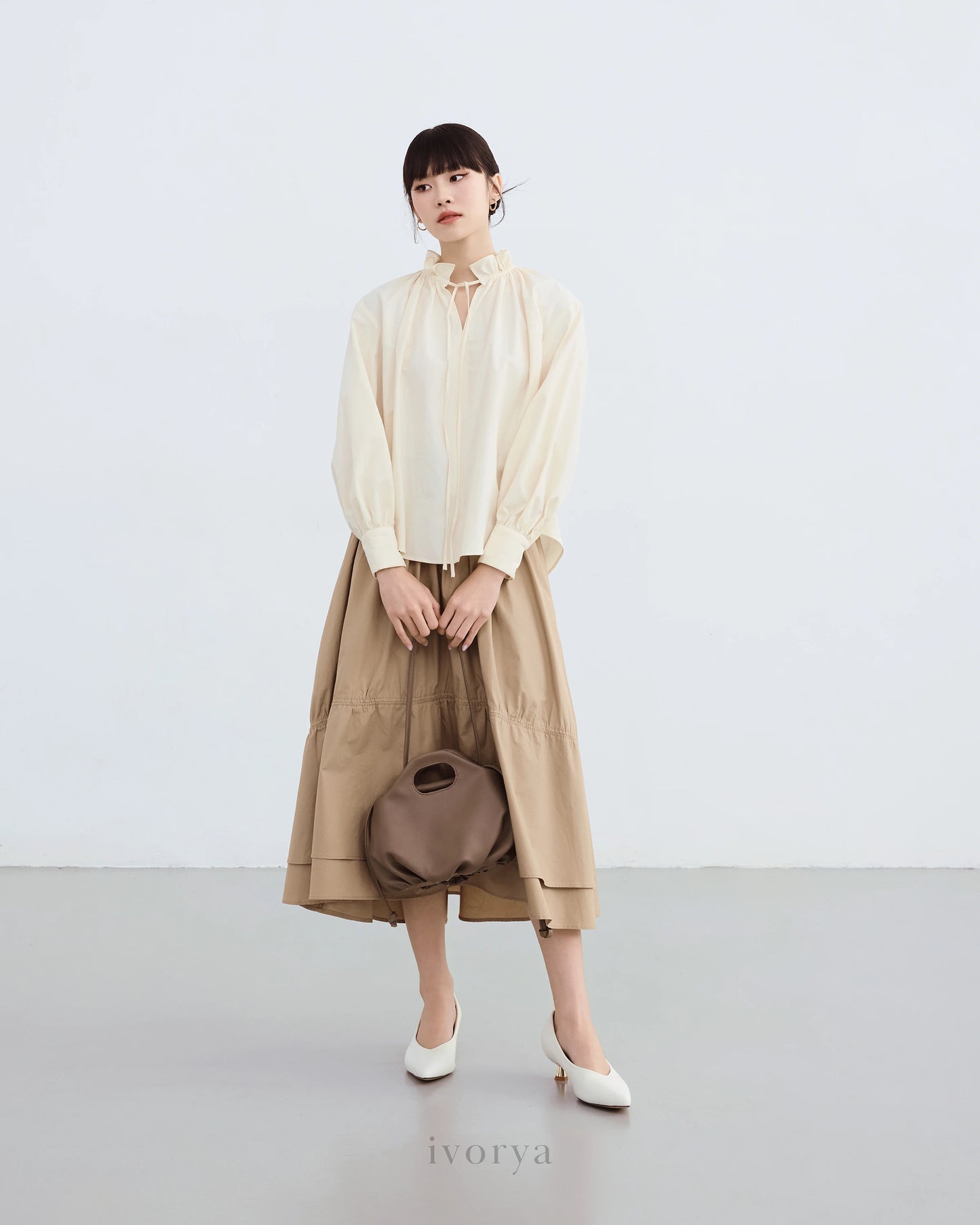 Chân váy midi xếp nhún màu be - SK9920C