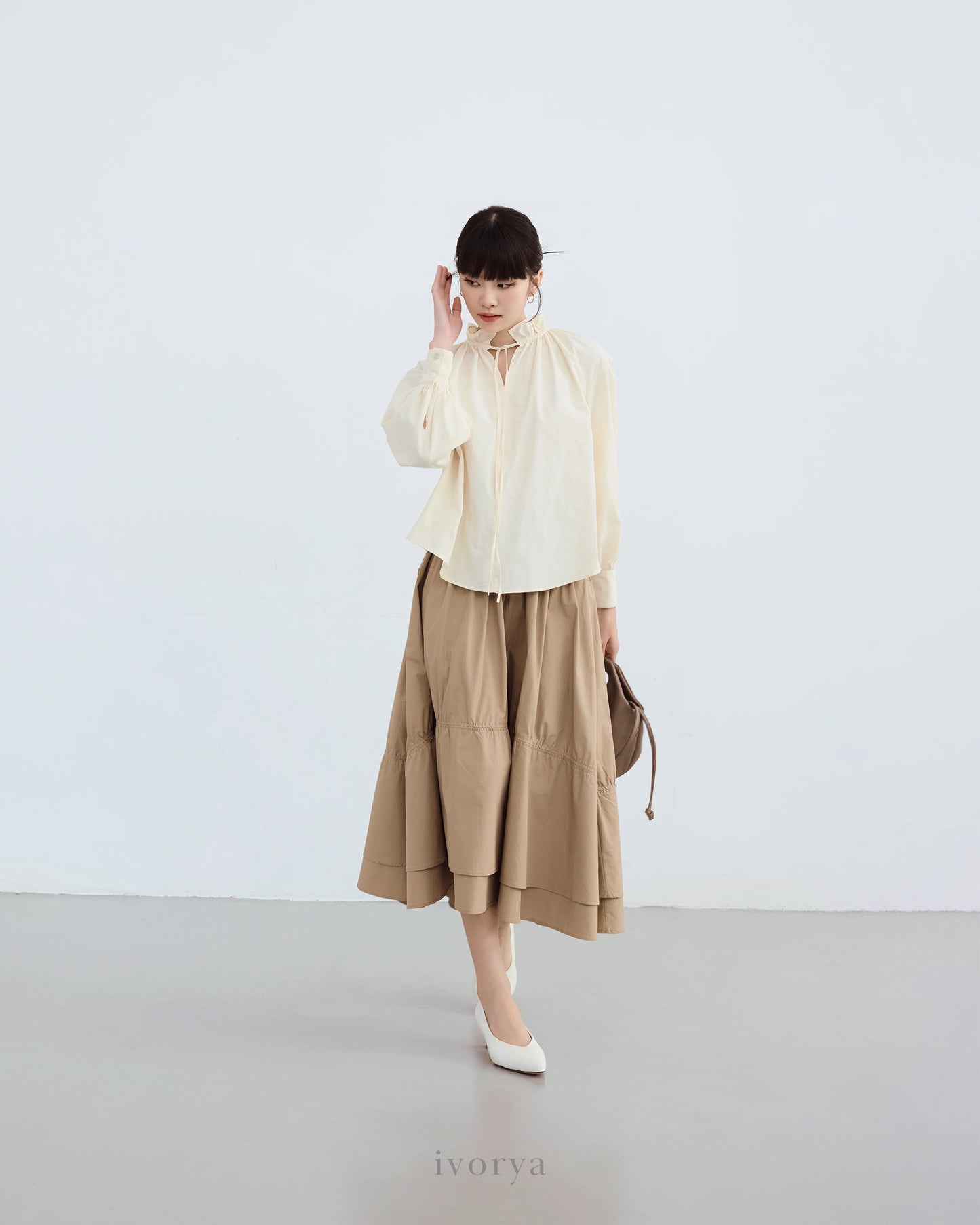 Chân váy midi xếp nhún màu be - SK9920C