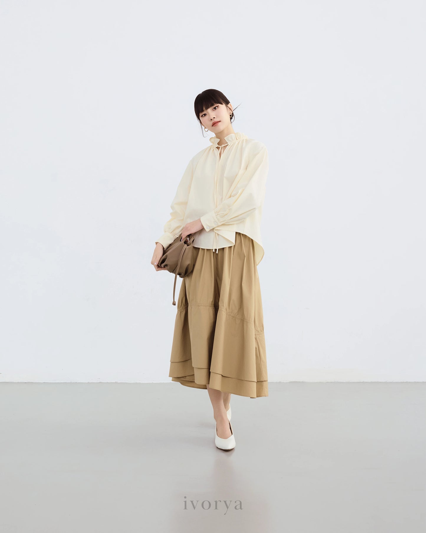 Chân váy midi xếp nhún màu be - SK9920C
