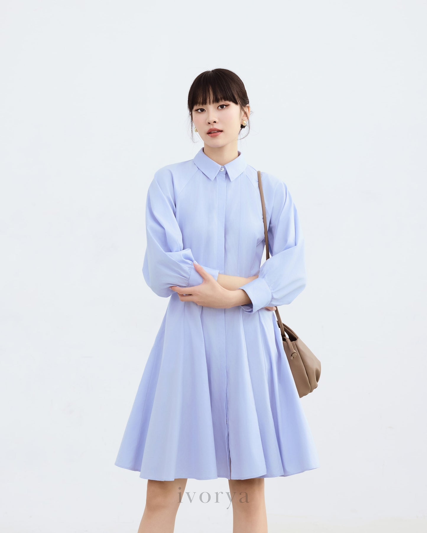 Đầm sơ mi màu xanh dương nhạt, tay dài xếp ly cách điệu - YD9836