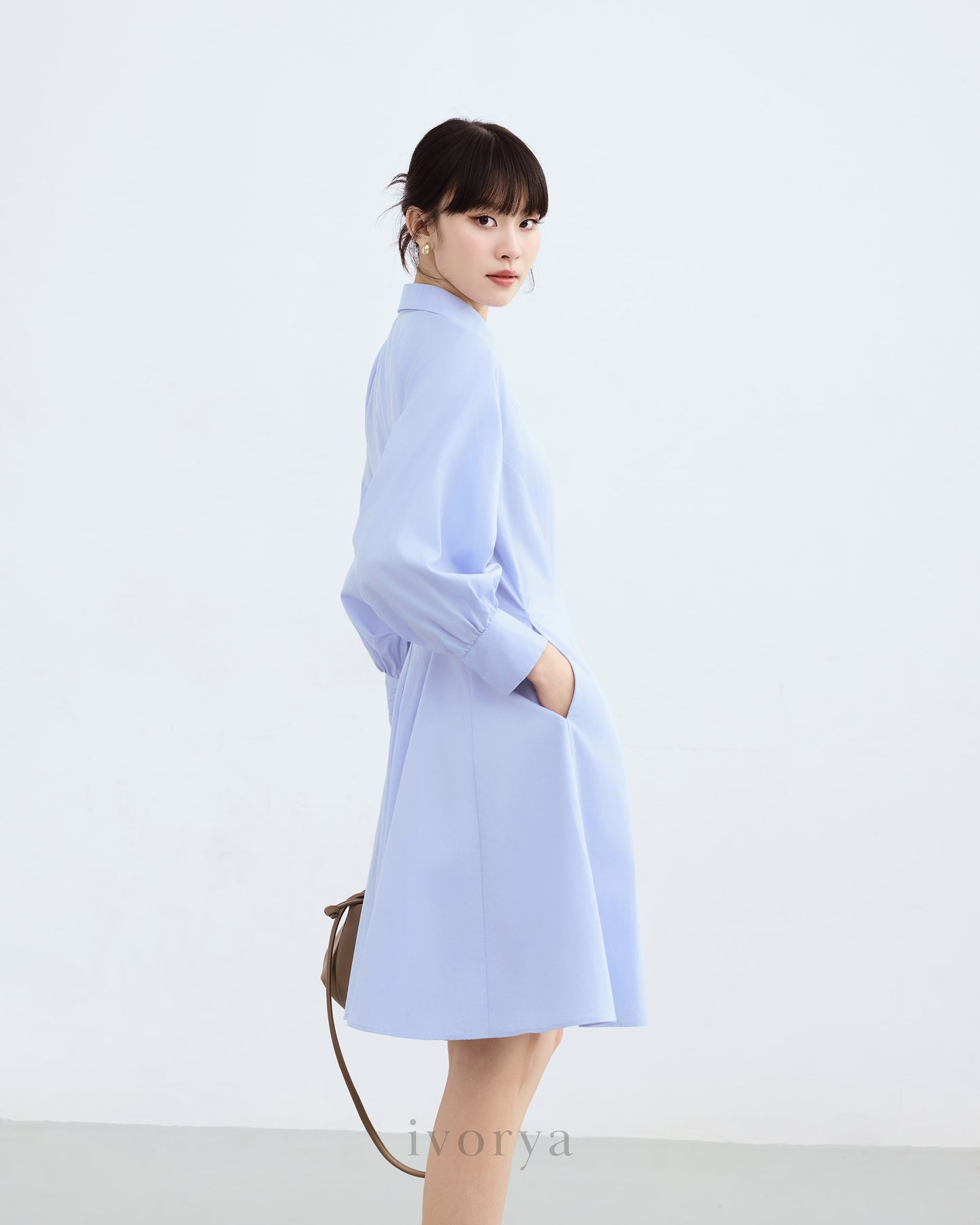 Đầm sơ mi màu xanh dương nhạt, tay dài xếp ly cách điệu - YD9836