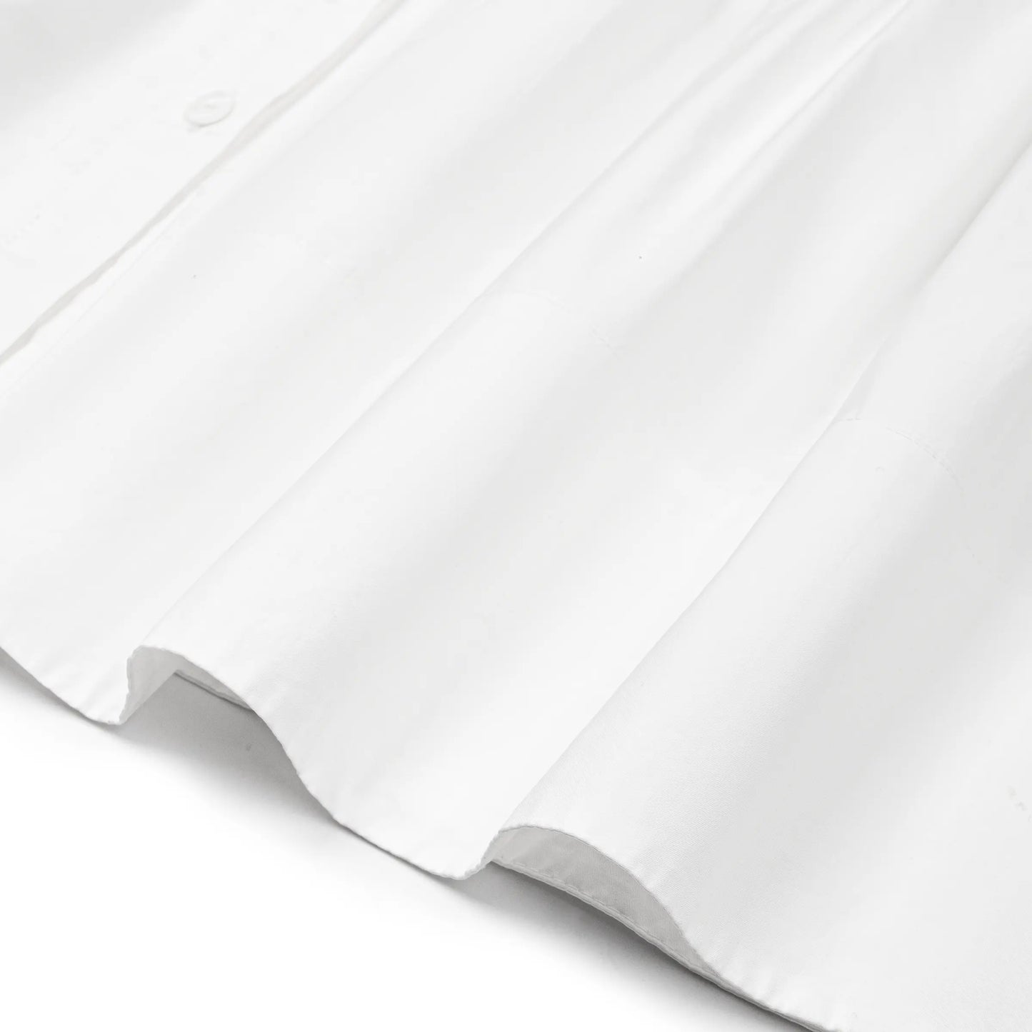 Đầm sơ mi màu trắng, dáng rộng và không tay  - YD9890