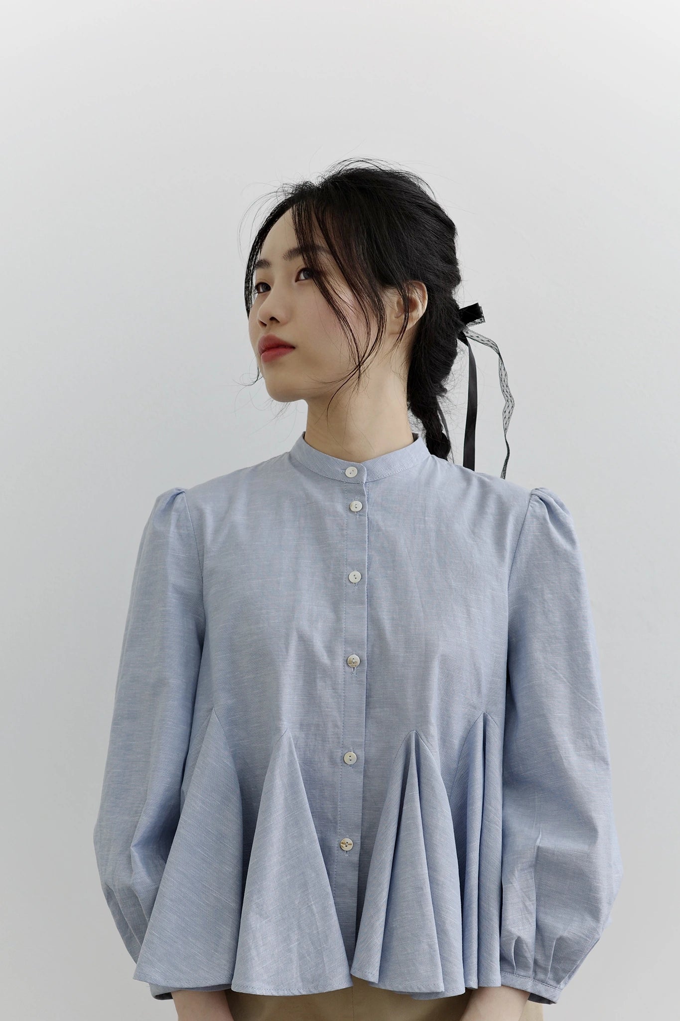 Áo sơ mi màu xanh nhạt lai xòe và tay lỡ - SH9782