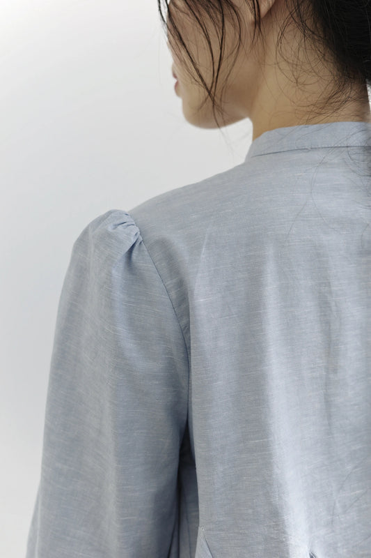 Áo sơ mi màu xanh nhạt lai xòe và tay lỡ - SH9782